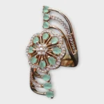 STONIRA adjustable gold cocktail ring with a mint green stone floral rosette and crystal-paved arches top view