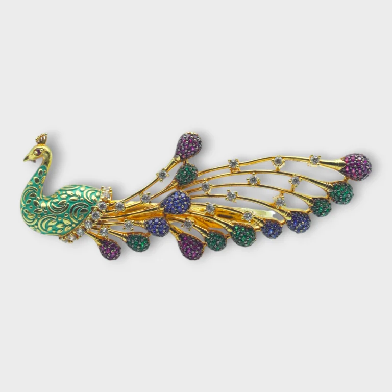 STONIRA peacock-inspired adjustable two-finger statement ring featuring turquoise enamel detailing, multicolour crystal accents and an elegant peacock feather design.