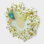 Adjustable swan ring with clustered pearl detailing by STONIRA