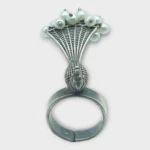 STONIRA adjustable statement ring featuring an oxidised silver peacock with a fan-shaped tail crowned in white pearls overview