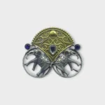 STONIRA adjustable mixed-metal cocktail ring featuring oxidized silver elephants, a golden archway, and sapphire crystal accents overview