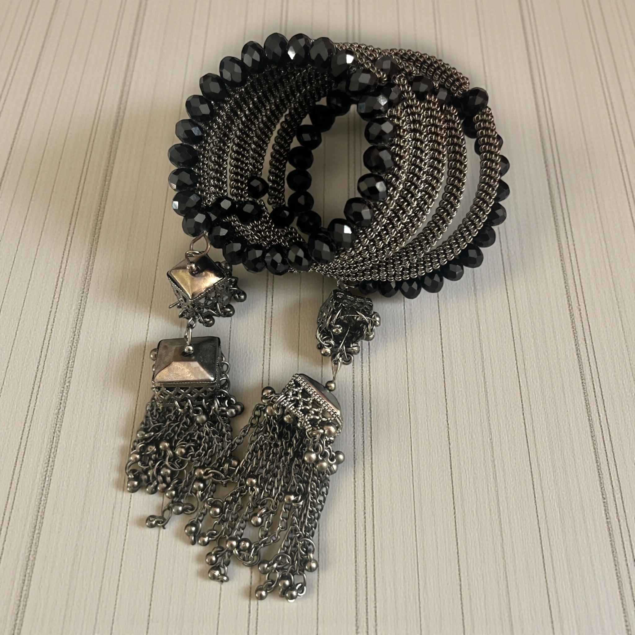 IMG_9382 Spiral Black Crystal Tassel Bracelet - Image 1