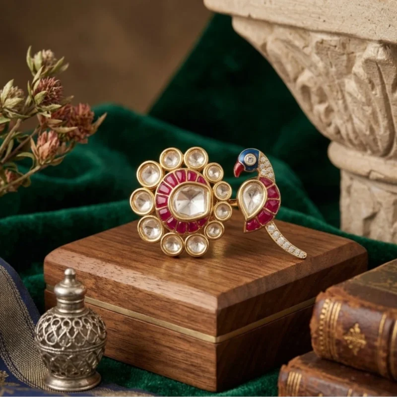 Peacock-inspired kundan ring with pink enamel accents