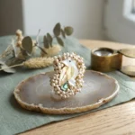 Swan-inspired pearl statement ring in gold-tone finish by STONIRA