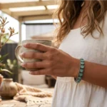 Continuous STONIRA oxidised silver slip-on bangle inlaid with soft mint green stones in size 2.4