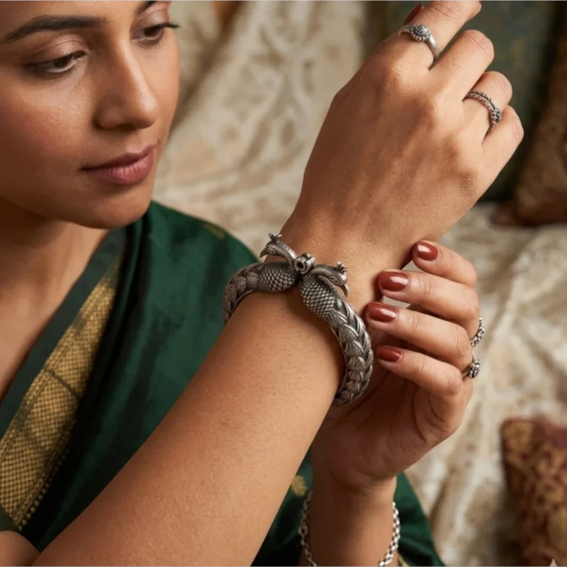 Classic peacock oxidised silver screw kada bangle by STONIRA
