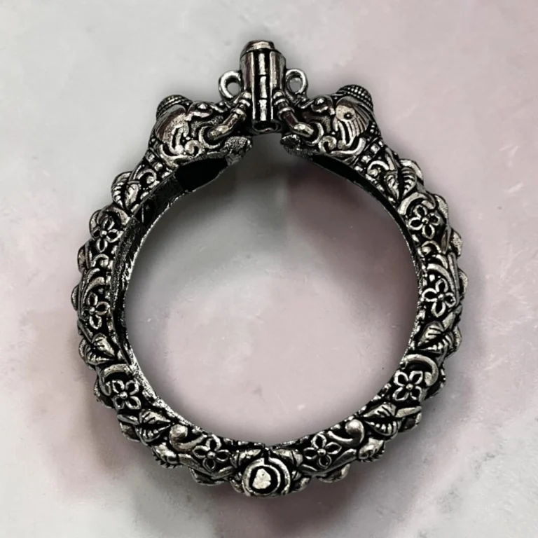 STONIRA oxidised silver elephant statement festive bangle showing top opening architectural clasp