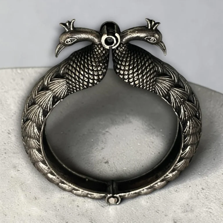 Classic peacock oxidised silver screw kada bangle top view by STONIRA