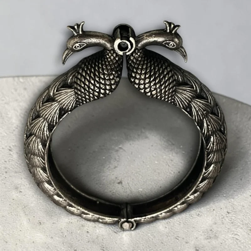 Classic peacock oxidised silver screw kada bangle top view by STONIRA