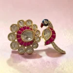 Close-up of kundan stones and peacock motif ring