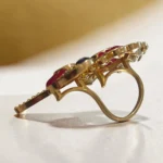 Back of adjustable peacock statement ring