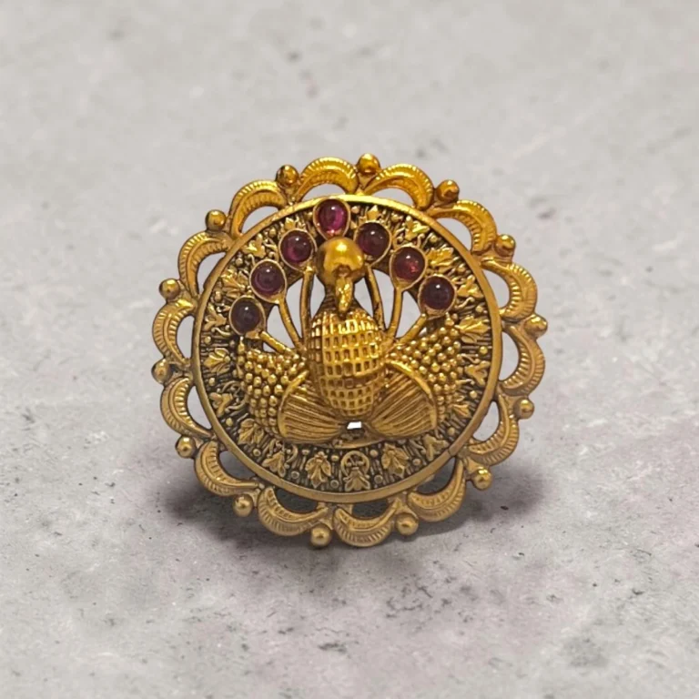 Peacock gold adjustable temple ring with ruby-toned accents by STONIRA