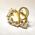 Adjustable swan ring with clustered pearl detailing