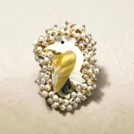 Swan-inspired pearl statement ring in gold-tone finish