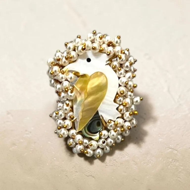 Swan-inspired pearl statement ring in gold-tone finish