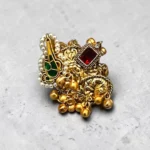 Overview of STONIRA adjustable gold temple charm ring featuring red gemstone, pearl accents, intricate heritage motifs and ghungroo detailing for festive and wedding wear.