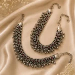 Close-up-of-STONIRA-oxidized-silver-anklet-showing-S-hook-clasp-extension-chain-and-intricate-ruby-stone-bezel-settings