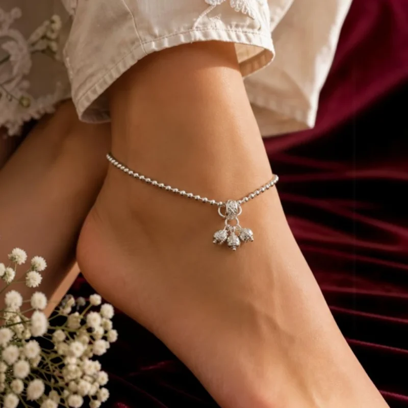 Women-wearing-STONIRA-modern-silver-spherical-bead-payal-anklet