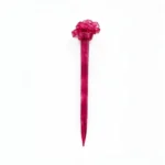 Berry magenta translucent resin hair stick with a sculpted knot detail
