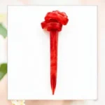 Crimson red resin hair stick with a sculpted knot centerpiece shown on a neutral backdrop.