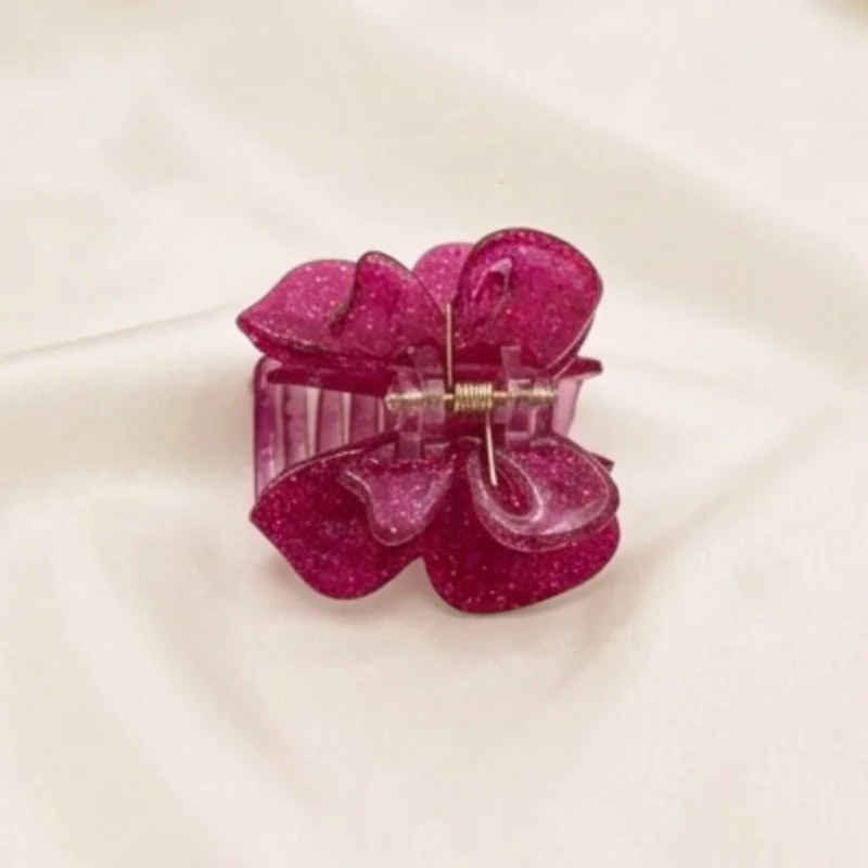 Deep magenta berry pink resin butterfly hair claw clip with dense micro-sparkles