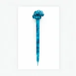 Ocean blue swirl resin hair stick featuring a hand-finished sculpted knot top.