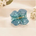 Ocean teal blue resin butterfly hair claw clip with shimmering micro-sparkles