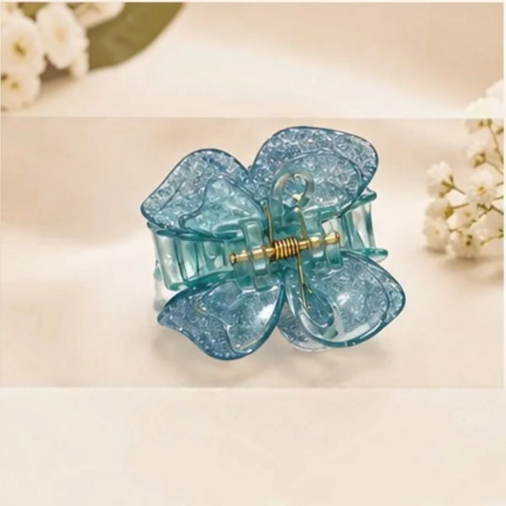 Ocean teal blue resin butterfly hair claw clip with shimmering micro-sparkles Ocean teal blue resin butterfly hair claw clip with shimmering micro-sparkles