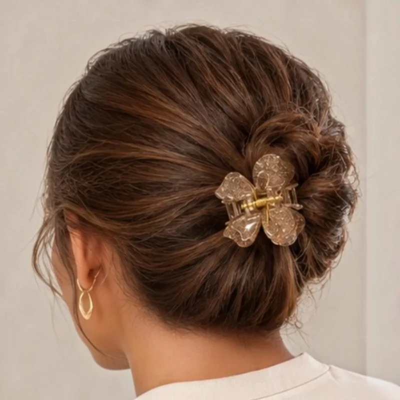 Women wearing Champagne shimmer resin butterfly hair claw clip